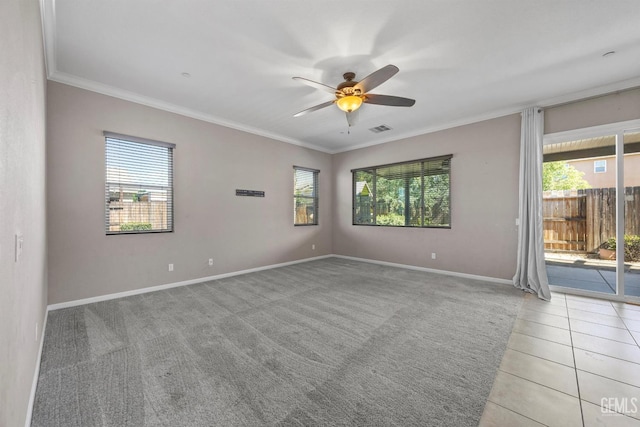 15420 Saint Clement Way, Bakersfield, CA 93314 - unfurnished room with plenty of natural light, ornamental molding, baseboards, a ceiling fan, and light carpet