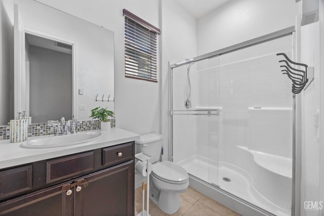 15420 Saint Clement Way, Bakersfield, CA 93314 - bathroom with toilet, tile patterned flooring, a shower stall, and vanity