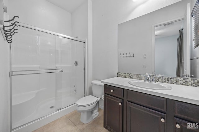 15420 Saint Clement Way, Bakersfield, CA 93314 - full bath with a shower stall, toilet, tile patterned floors, and vanity