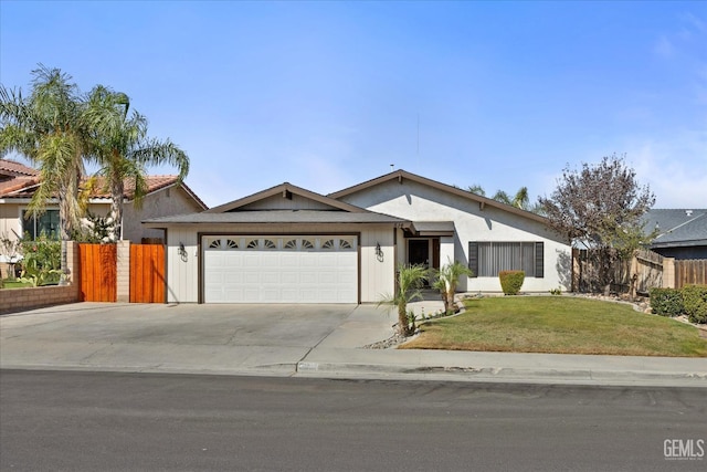 single story home featuring a front yard and a garage