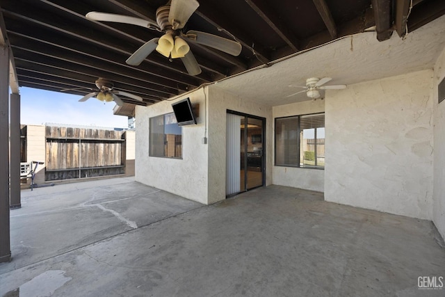 view of patio featuring ceiling fan