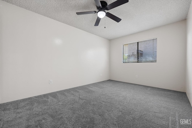 unfurnished room featuring a textured ceiling, carpet floors, and ceiling fan