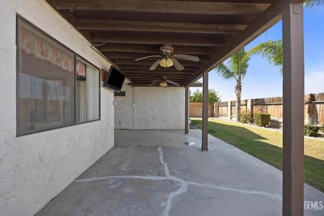 view of patio featuring ceiling fan