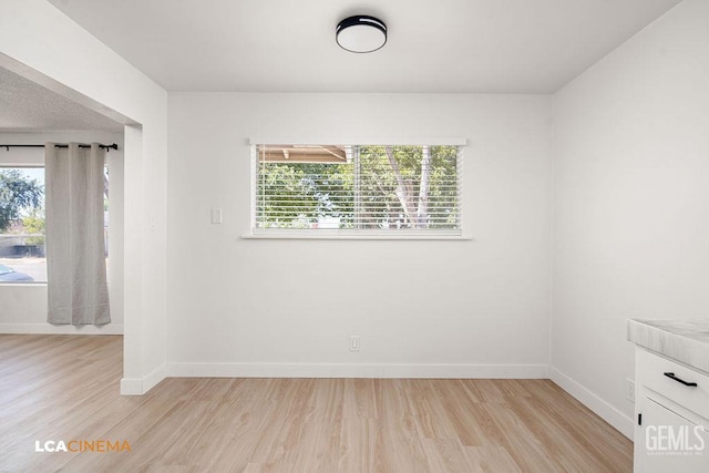 417 B St, Taft, CA 93268 - unfurnished room featuring light wood-type flooring and plenty of natural light