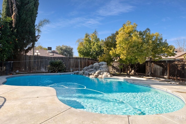 view of pool with a fenced backyard and a fenced in pool