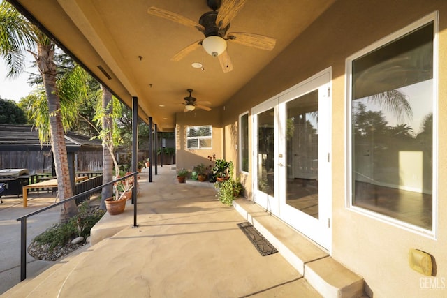 view of patio with ceiling fan and french doors