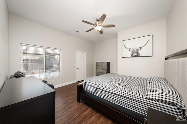 bedroom featuring dark wood-type flooring and ceiling fan