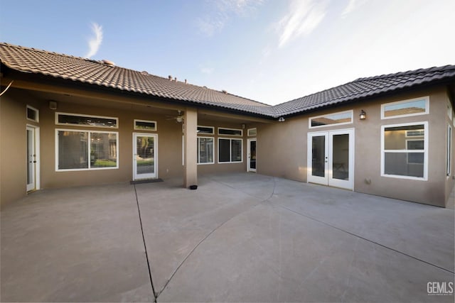 back of house featuring french doors and a patio area