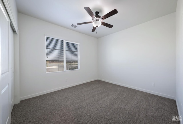 5817 Neutra Dr, Bakersfield, CA 93311 - unfurnished room featuring dark colored carpet and a ceiling fan