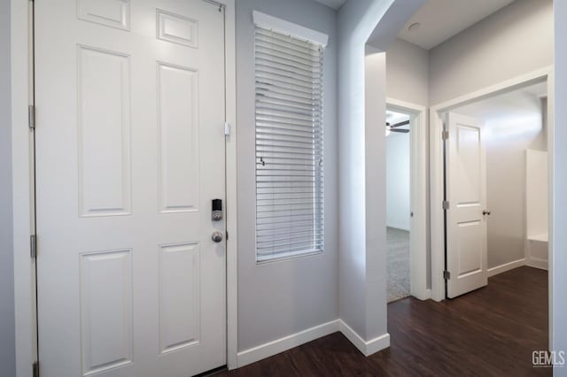 5817 Neutra Dr, Bakersfield, CA 93311 - entryway with dark wood finished floors and arched walkways