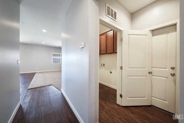 5817 Neutra Dr, Bakersfield, CA 93311 - hallway featuring dark wood-style floors and recessed lighting