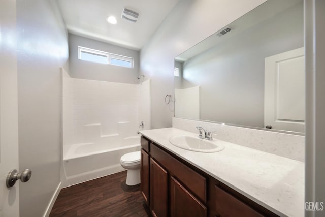 5817 Neutra Dr, Bakersfield, CA 93311 - full bath with wood finished floors, vanity, and shower / washtub combination