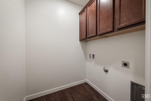 5817 Neutra Dr, Bakersfield, CA 93311 - laundry room featuring hookup for an electric dryer, cabinet space, dark wood-style floors, and hookup for a washing machine