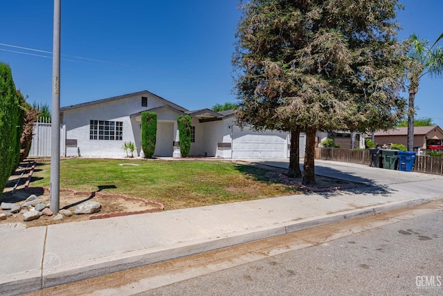 1857 Fern Tree Close, Wasco, CA 93280 - view of front facade featuring driveway, an attached garage, and stucco siding