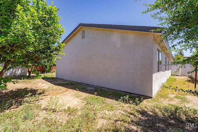 1857 Fern Tree Close, Wasco, CA 93280 - view of home's exterior featuring stucco siding