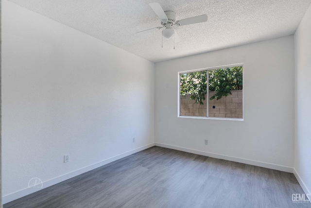 1857 Fern Tree Close, Wasco, CA 93280 - unfurnished room featuring wood finished floors, a textured ceiling, and a ceiling fan