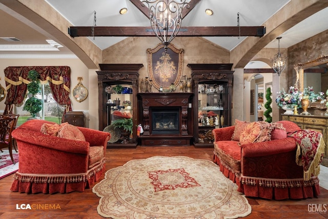 living room with arched walkways, lofted ceiling with beams, visible vents, a glass covered fireplace, and an inviting chandelier