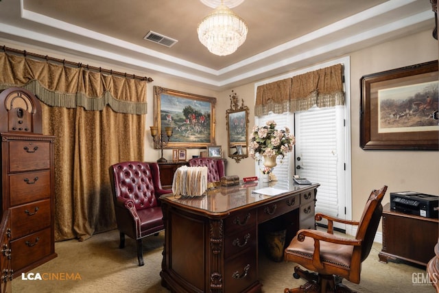 home office featuring a notable chandelier, a raised ceiling, visible vents, and light colored carpet