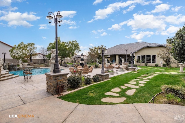 exterior space with a patio, a yard, and fence