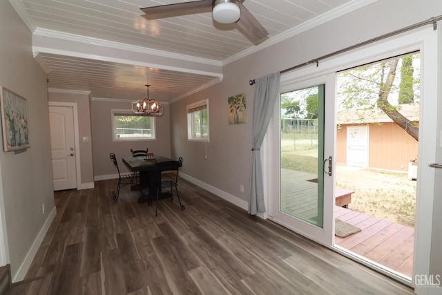 dining area featuring ceiling fan with notable chandelier, dark hardwood / wood-style floors, and crown molding