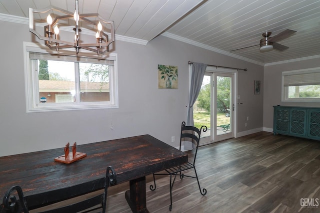 dining room featuring ceiling fan with notable chandelier, dark hardwood / wood-style flooring, crown molding, and vaulted ceiling