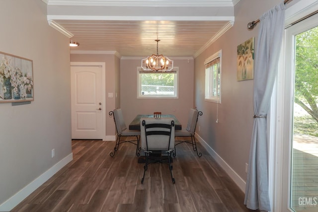 dining room featuring dark hardwood / wood-style flooring, an inviting chandelier, and ornamental molding