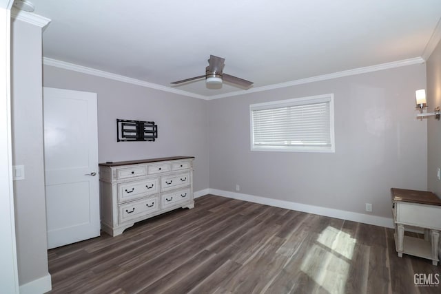 unfurnished bedroom with ceiling fan, dark hardwood / wood-style floors, and crown molding