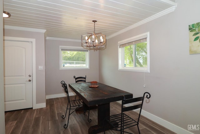 dining area with crown molding, dark wood-type flooring, and a notable chandelier