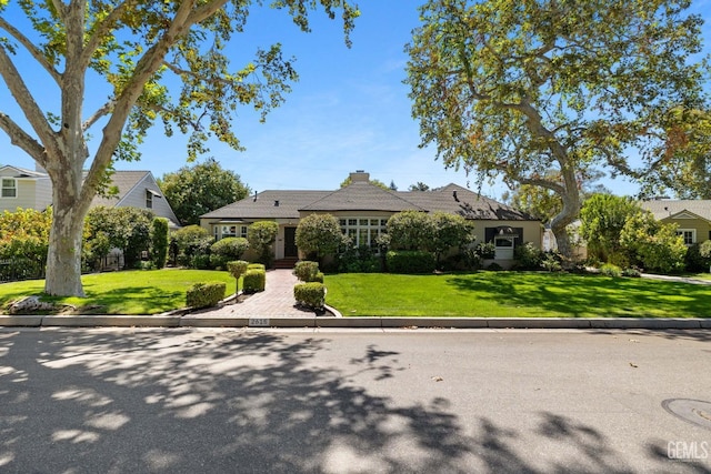 view of front of home with a front yard