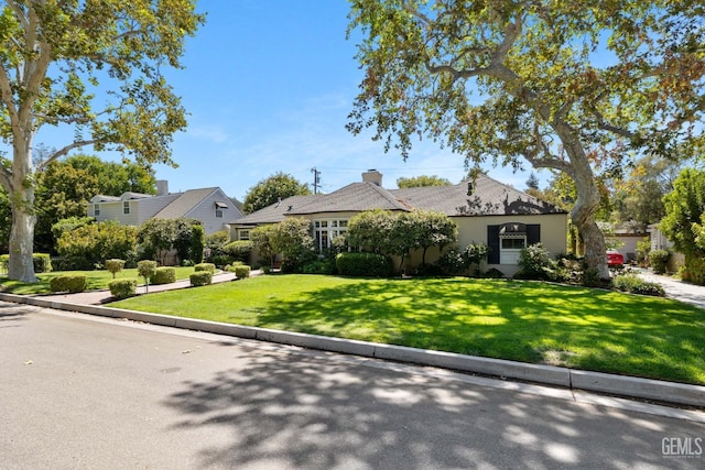 view of front of house with a front yard