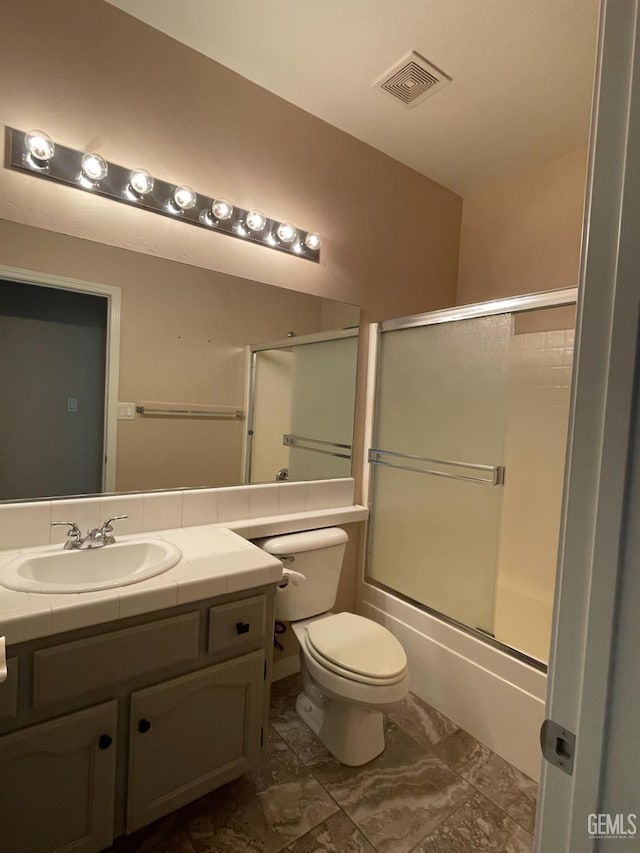 12007 Roaring River Ave, Bakersfield, CA 93311 - full bath with toilet, vanity, and bath / shower combo with glass door