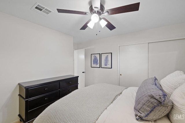 bedroom featuring a closet and ceiling fan