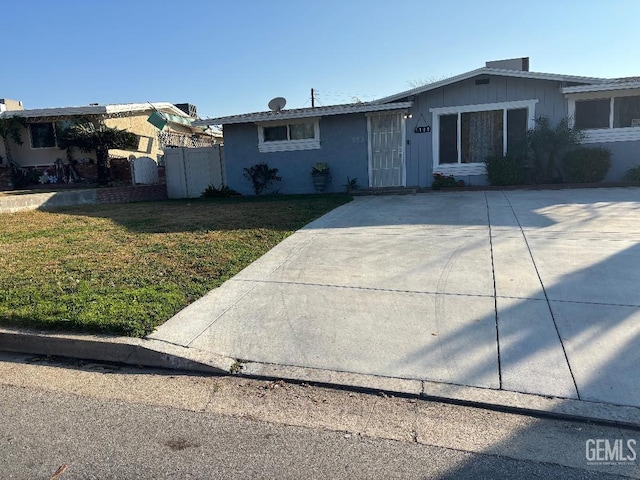 ranch-style house with a front yard