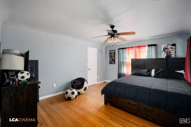13271 Garzoli Ave, Mc Farland, CA 93250 - bedroom with wood finished floors, baseboards, and ceiling fan
