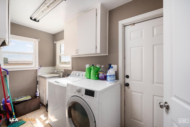 13271 Garzoli Ave, Mc Farland, CA 93250 - clothes washing area featuring separate washer and dryer and cabinet space