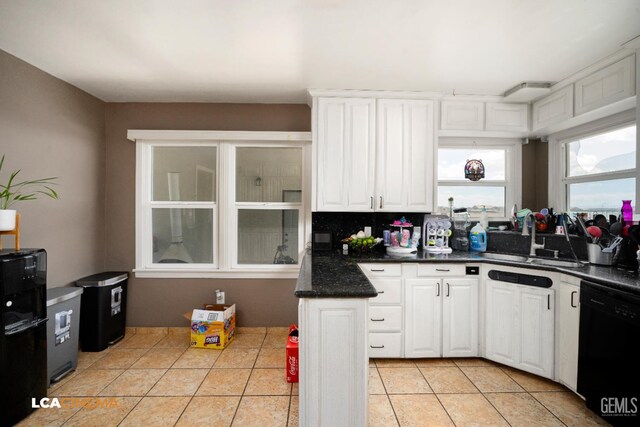 13271 Garzoli Ave, Mc Farland, CA 93250 - kitchen with black dishwasher, a sink, white cabinetry, light tile patterned floors, and dark countertops