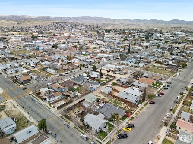 drone / aerial view with a mountain view and a residential view
