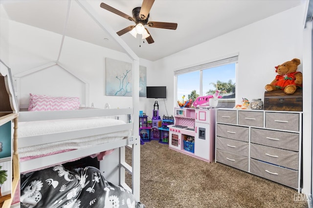 bedroom featuring a ceiling fan, lofted ceiling, and carpet floors