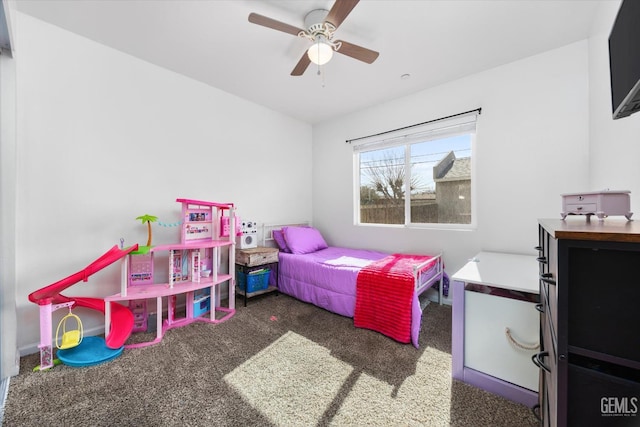 carpeted bedroom with a ceiling fan