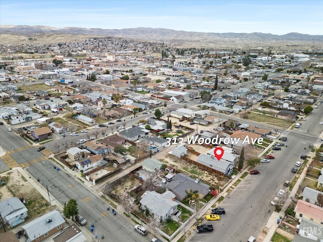 bird's eye view featuring a mountain view and a residential view