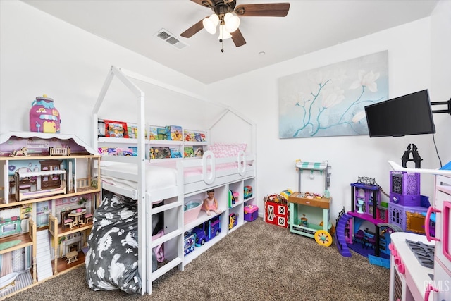 carpeted bedroom featuring ceiling fan and visible vents