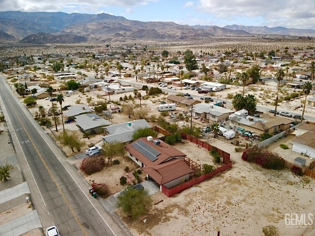 aerial view featuring a mountain view and a residential view