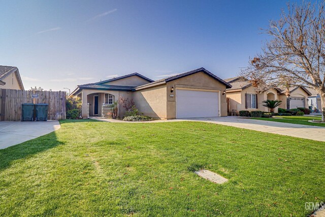 single story home featuring a garage and a front lawn