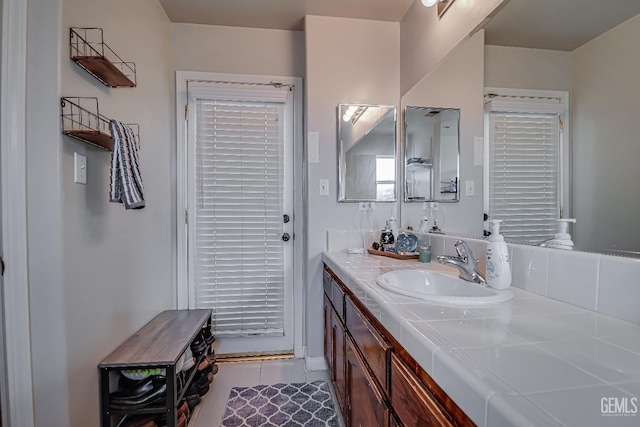 bathroom featuring vanity and tile patterned flooring