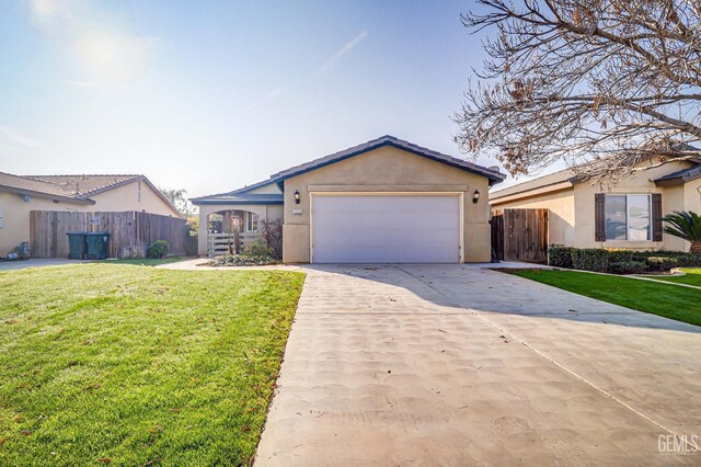 ranch-style house with a front yard and a garage