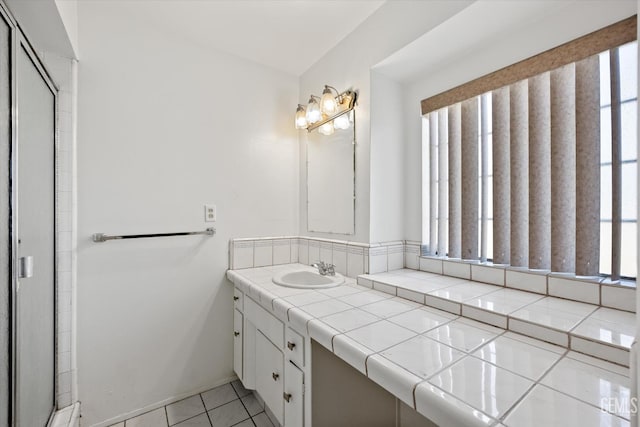 bathroom featuring vanity and tile patterned floors