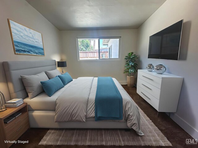 3417 River Blvd, Bakersfield, CA 93305 - bedroom featuring dark colored carpet and baseboards