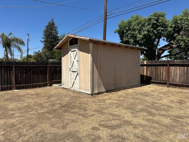 3417 River Blvd, Bakersfield, CA 93305 - view of shed with a fenced backyard
