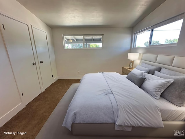 3417 River Blvd, Bakersfield, CA 93305 - bedroom featuring dark carpet and multiple windows
