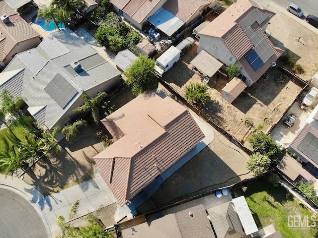 birds eye view of property with a residential view